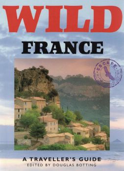 The front cover for Wild France features a photograph of a Provençale village.