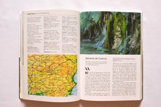 A regional map and a photograph of the Rio Cuervo illustrate two pages of Wild Spain.