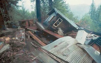 In a photograph taken by the US Geographical Survey a house destroyed by the Loma Prieta earthquake of 17th October 1989 keels over at a drunken angle.