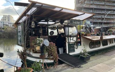A Dutch barge on Regent’s canal has been converted into a bookshop and adorned with pot plants.