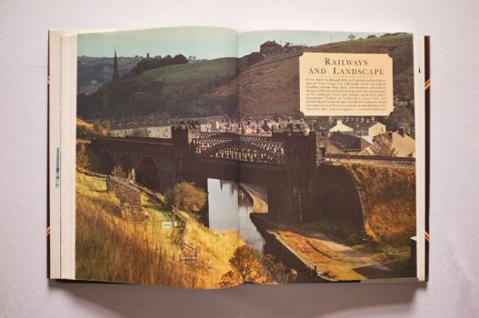 A double-page colour photograph opens a picture feature on Railways and Landscape on pages 83-83 of The Railway Heritage of Britain, demonstrating how the Gauxholme Viaduct at Todmorden was designed to fit into – and even improve – the landscape. 