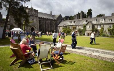 Writers and readers in the garden of Dartington Hall, Devon.
