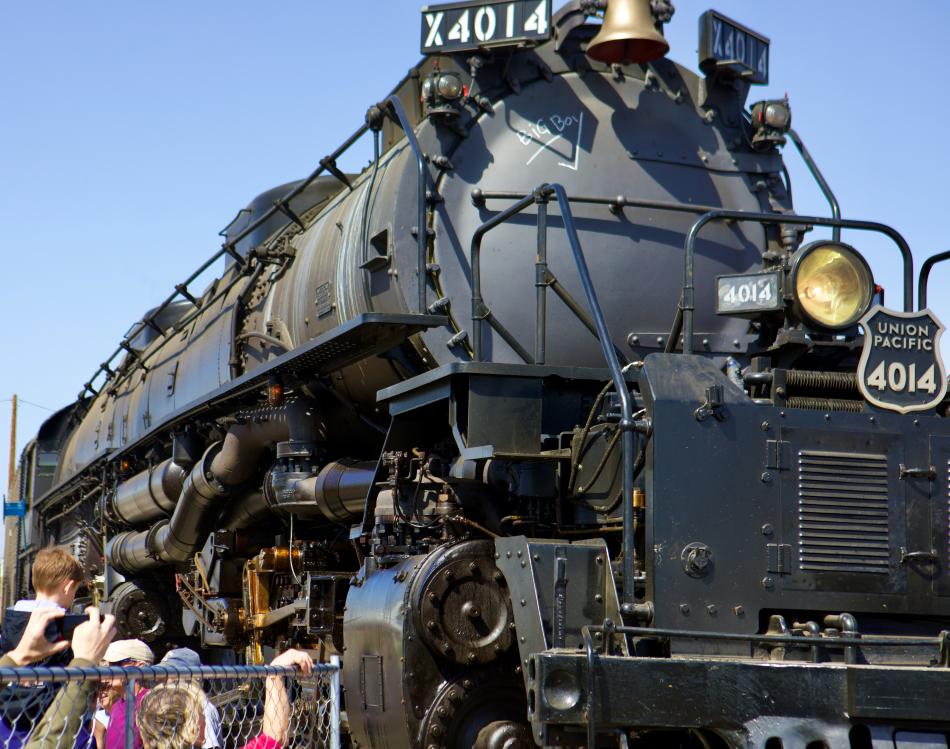 In this color photograph of Big Boy 4014 taken by Ian Logan in October 2019, crowds cluster around Big Boy 4014 in the Union Pacific West Colton Yard, Los Angeles.