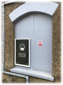 A boarded-up window opening at Eynsford Station. 