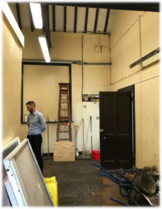 The interior of the former ladies’ waiting room at Eynsford Station is defaced by electrical cables and partition walls.