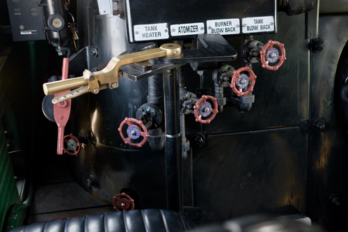 In this colour photograph, four valves are laid out in front of the fireman’s seat including those responsible for operating Big Boy 4014’s tank heater and atomiser.