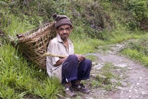 A farmer rests from gathering crops near Barranumber