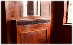 Mahogany panelling and radiator cover at Leamington Spa Station. 