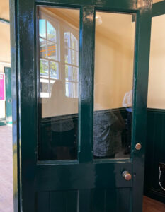 A close-up of the waiting-room door at Eynsford Station.