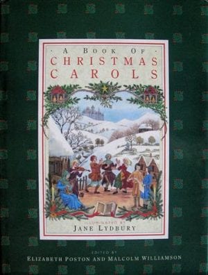 The cover of A Book of Christmas Carols features a scene of villagers singing in the snow.