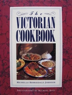 The cover of The Victorian Cookbook features a veritable feast popular in Imperial India.