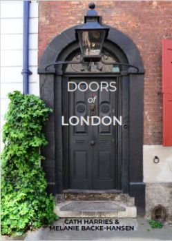 The black front door of Dennis Severs’ House in Spitalfields contrasts boldly with the red brick of the façade and the terracotta of the shutters.