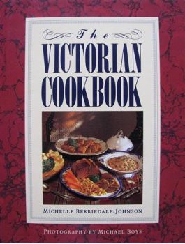 The cover of The Victorian Cookbook features a veritable feast popular in Imperial India.